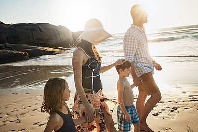 Buy stock photo Beach, family and walking on vacation in nature, support and weekend trip on coast of Italy. Parents, children and happiness together on holiday at sea, ocean and bonding on travel adventure to relax