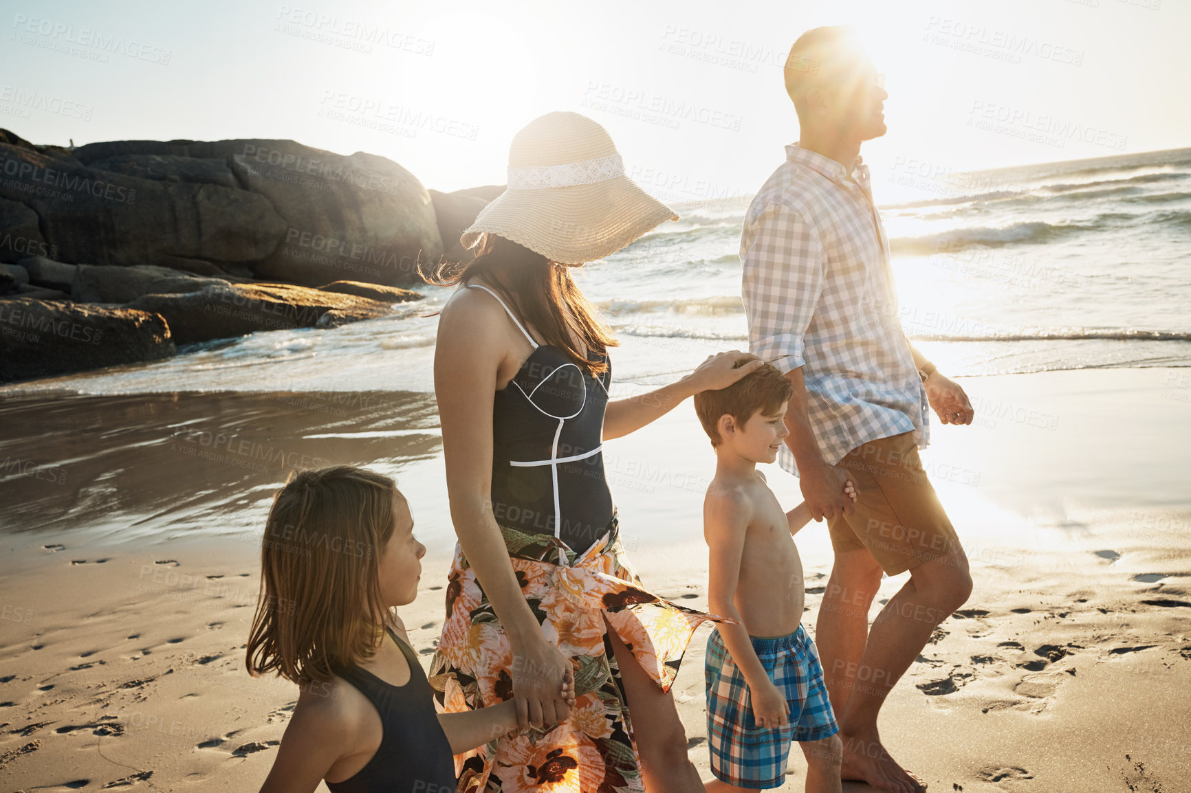 Buy stock photo Beach, family and walking on vacation in nature, support and weekend trip on coast of Italy. Parents, children and happiness together on holiday at sea, ocean and bonding on travel adventure to relax