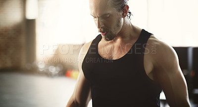 Buy stock photo Workout, exercise and strong man training in a gym or fitness club muscle building for health or wellness. Sweat, endurance and sports person or athlete serious, focus and determined with motivation