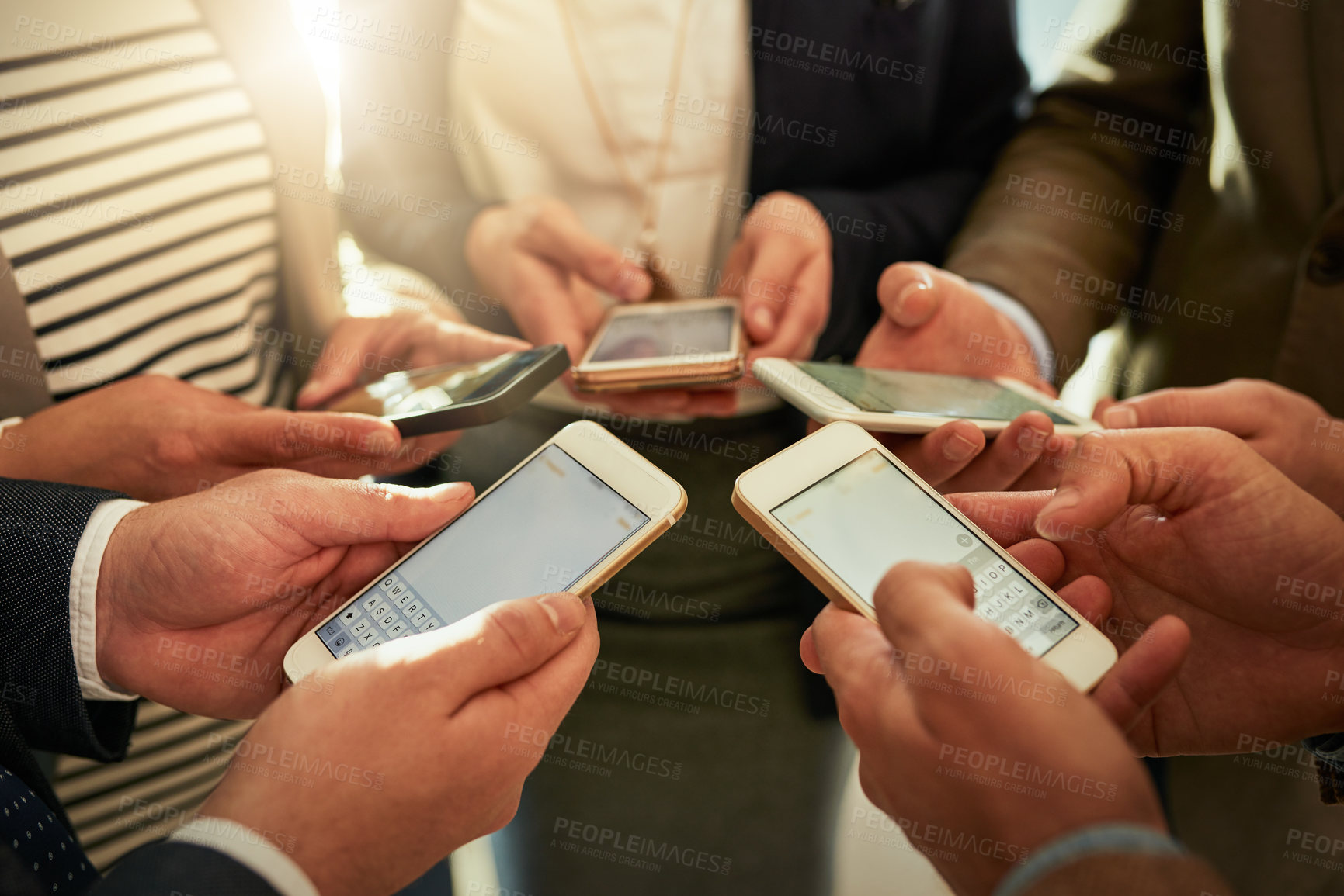 Buy stock photo Business people, hands and typing with phone for data sync, sharing or communication at office. Closeup, group or employees on mobile smartphone for social media, texting or chatting at workplace