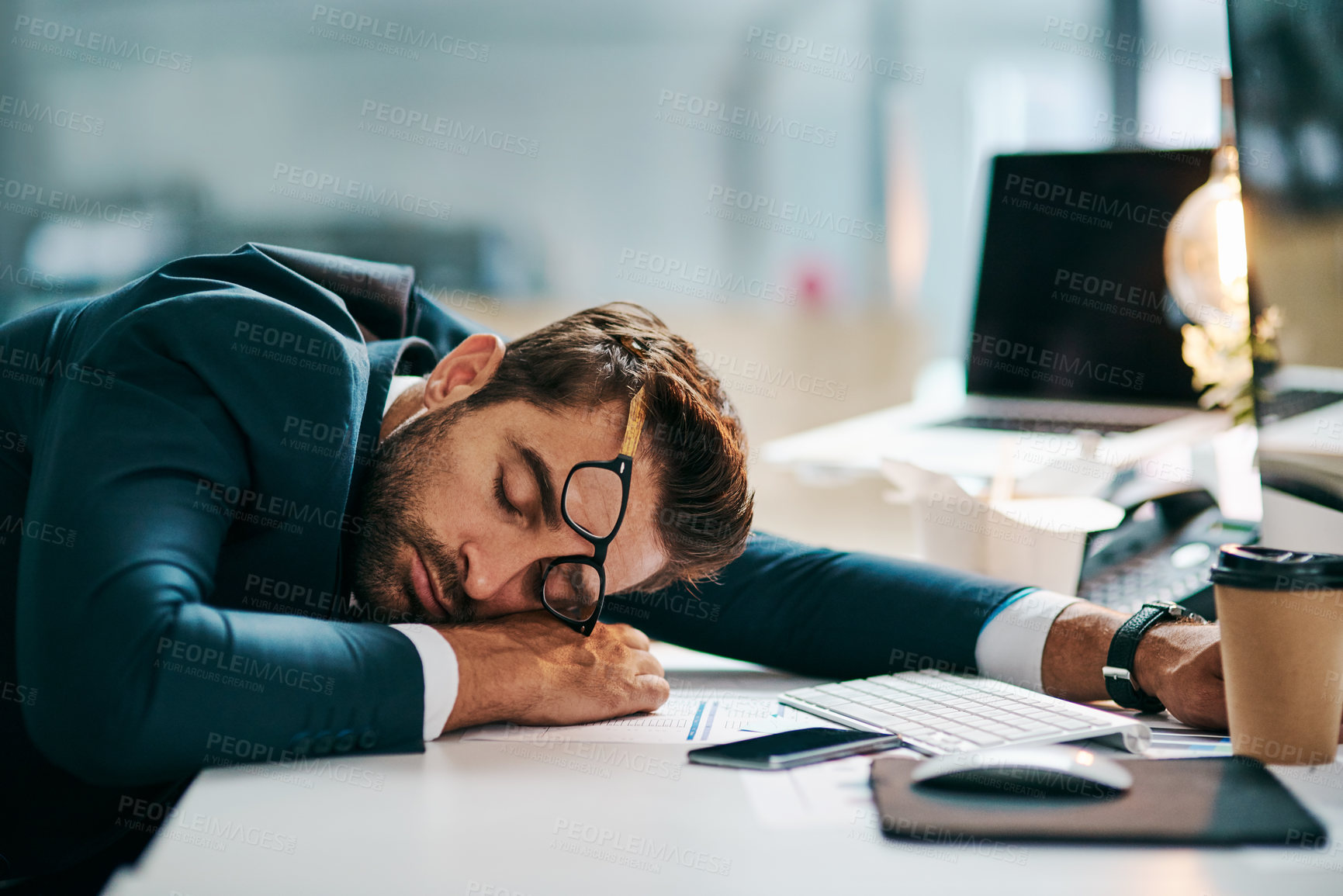 Buy stock photo Employee, man and sleeping on computer at office with burnout or tired with research for project deadline. Male person, business and exhausted on nap with overtime, overworked and fatigue on desk