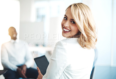 Buy stock photo Cropped portrait of an attractive young businesswoman sitting in the office during a meeting
