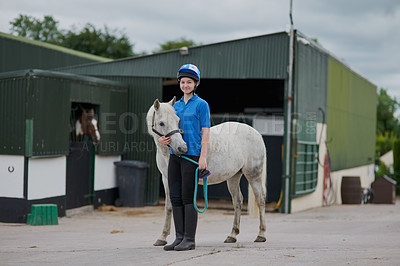 Buy stock photo Girl, horse and portrait outdoor for equestrian, development and learning with bonding or connection. Teenager, animal and pet by stable for riding, care and fitness with smile, exercise and helmet
