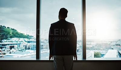 Buy stock photo Thinking, window and back of businessman in office with vision, ideas or dreaming of future in career. Professional, goals and male real estate agent by glass door for decision, choice or opportunity