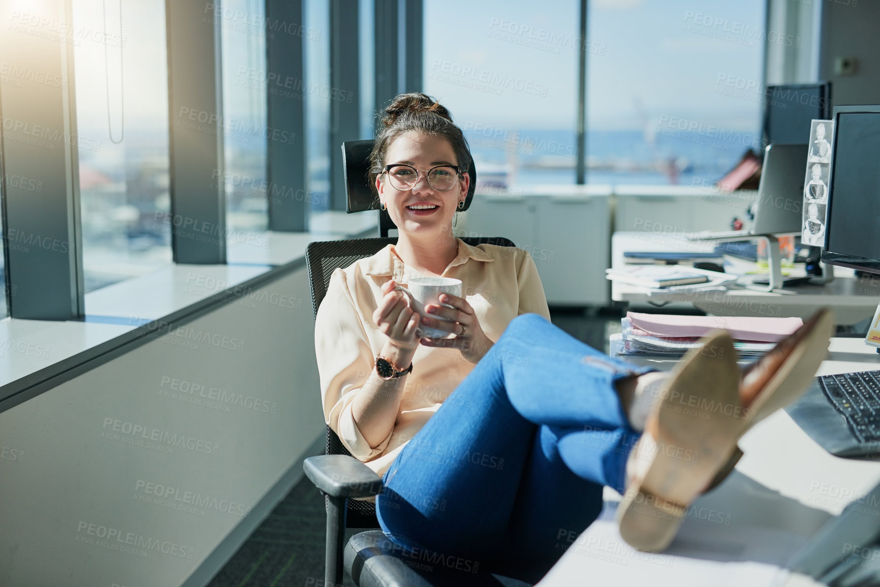 Buy stock photo Portrait, glasses and woman with coffee, office and relax in break, smile and confident for business. Drinking, tea and proud of copywriting, creative and calm for research, laptop and feet on desk