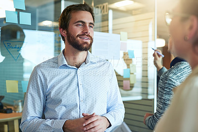 Buy stock photo Shot of businesspeople brainstorming in an office