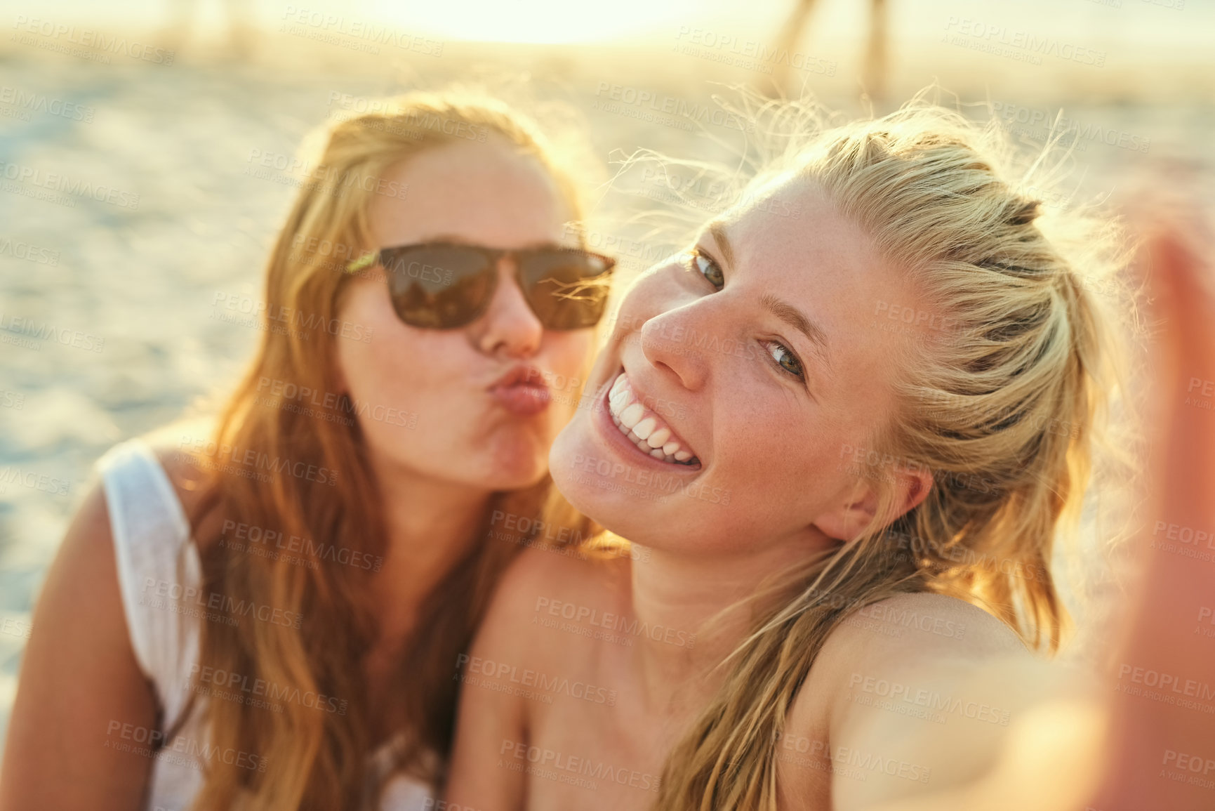 Buy stock photo Portrait, lesbian and couple with selfie at beach for summer photography, vacation and social media post. Smile, lgbtq and women for romance with profile picture update, bonding and travel together