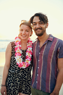 Buy stock photo Love, smile and portrait of couple on beach together for honeymoon in Hawaii with garland. Date, romance or travel with happy man and woman outdoor for bonding, celebration or holiday vacation