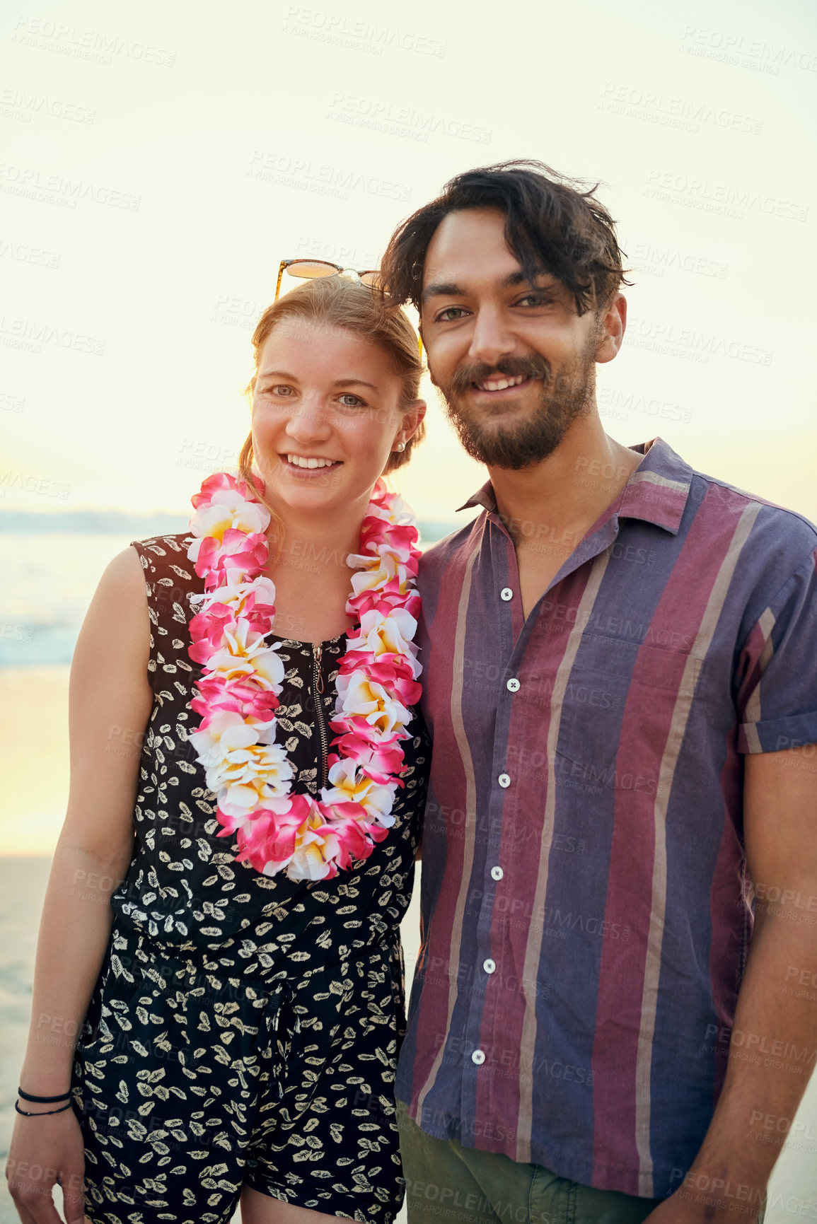 Buy stock photo Love, smile and portrait of couple on beach together for honeymoon in Hawaii with garland. Date, romance or travel with happy man and woman outdoor for bonding, celebration or holiday vacation