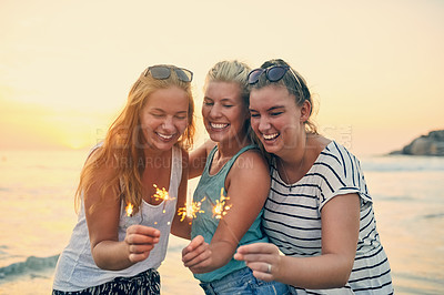 Buy stock photo Shot of young female best friends hanging out at the beach