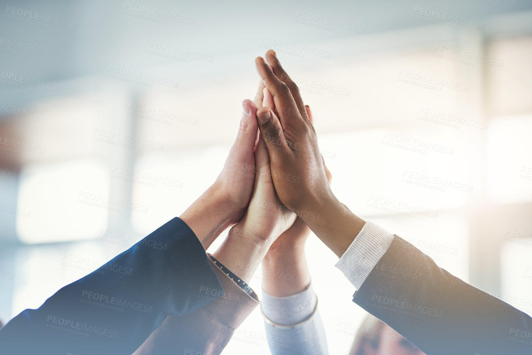 Buy stock photo High five, businesspeople and their hands together for cooperation with lens flare. Collaboration or teamwork, group or coworkers support and people with hand in air for unity or achievement 