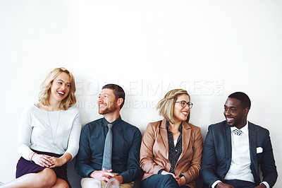 Buy stock photo Shot of a group of entrepreneurs sitting against a white background