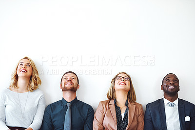 Buy stock photo Shot of a group of entrepreneurs sitting against a white background