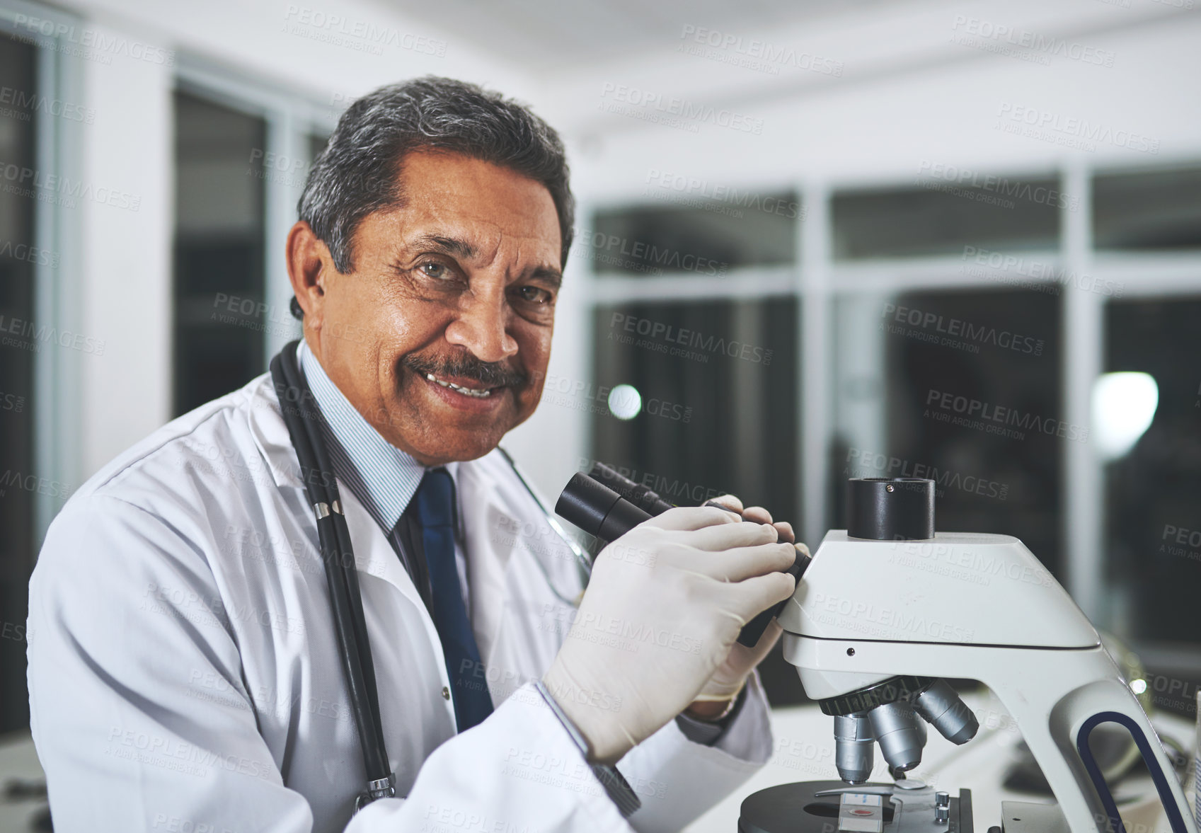 Buy stock photo Scientist, microscope and science in lab for innovation, analysis and medical healthcare development. Mature man, portrait and microbiome study for pharmaceutical breakthrough and stem cell research