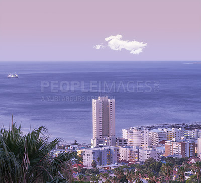 Buy stock photo Aerial view of Sea Point, Cape Town, South Africa. High angle seascape of the blue ocean and fancy hotels on the city beachfront in a tourist holiday location during a warm summer day and blue sky 