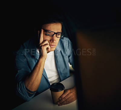 Buy stock photo Programmer, computer and tired at night with coffee for programming, coding or cybersecurity research. Man, pc and bored in office with tea for information technology, glitch and software development