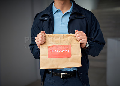 Buy stock photo Cropped shot of an unrecognizable man delivering take away food