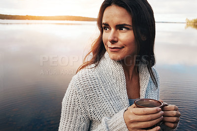 Buy stock photo Cropped shot of an attractive young woman spending time alone by the lake