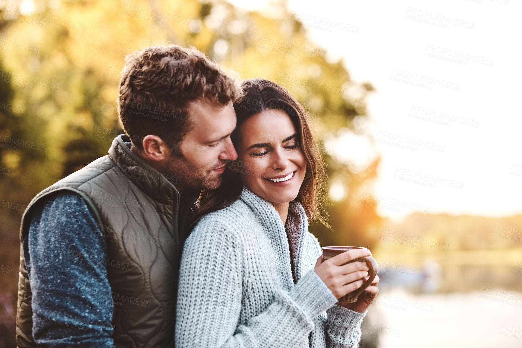 Buy stock photo Couple, travel and smile with coffee in nature, hug and relax in countryside for honeymoon and morning. Outdoor, man and woman with calm, peace and love in Oklahoma, bonding and cup of tea on date