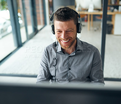 Buy stock photo Man, call center and smile by computer for consulting, typing and reading with voip. Agent, headphones and mic for tech support, telemarketing and happy for customer care with advice in workplace