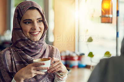 Buy stock photo Smile, thinking and muslim woman with hijab in coffee shop for memory, happiness or peaceful lunch break. Lens flare, cappuccino and islamic person with cup for idea, remember or daydreaming in cafe