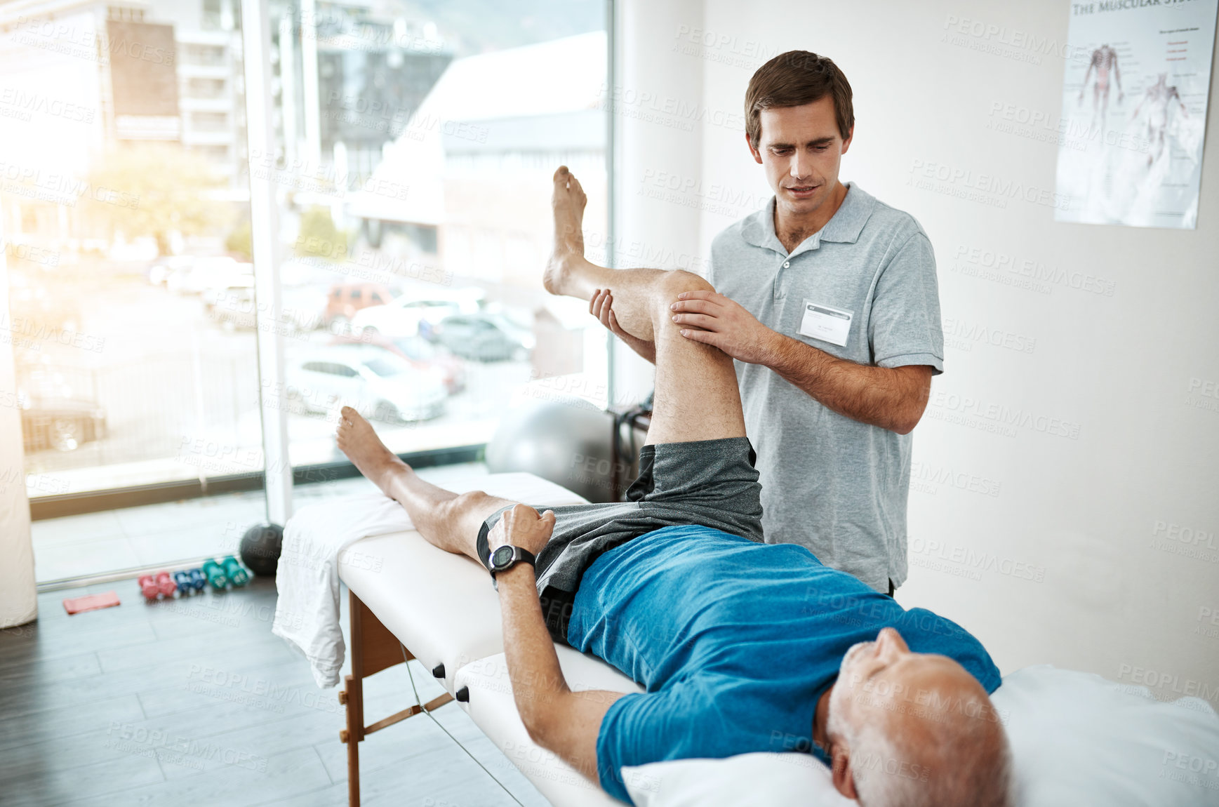 Buy stock photo Stretching legs, mature man and physiotherapy with injury in clinic for physical therapy, support or mobility exercise. Health, male nurse and patient for help, muscle recovery or rehabilitation