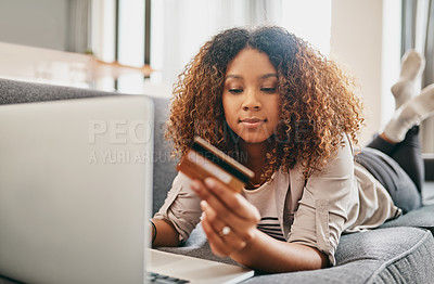 Buy stock photo Woman, home and credit card with laptop on sofa for balance transfer, transaction and paying debt. House, finance and person with fintech for online banking, installment and verification on platform