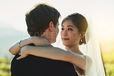 Buy stock photo Couple, hugging and happy outside for wedding, bride and groom with love embrace together with affection. Romance, nature and commitment people for trust, respect and marital celebration with care
