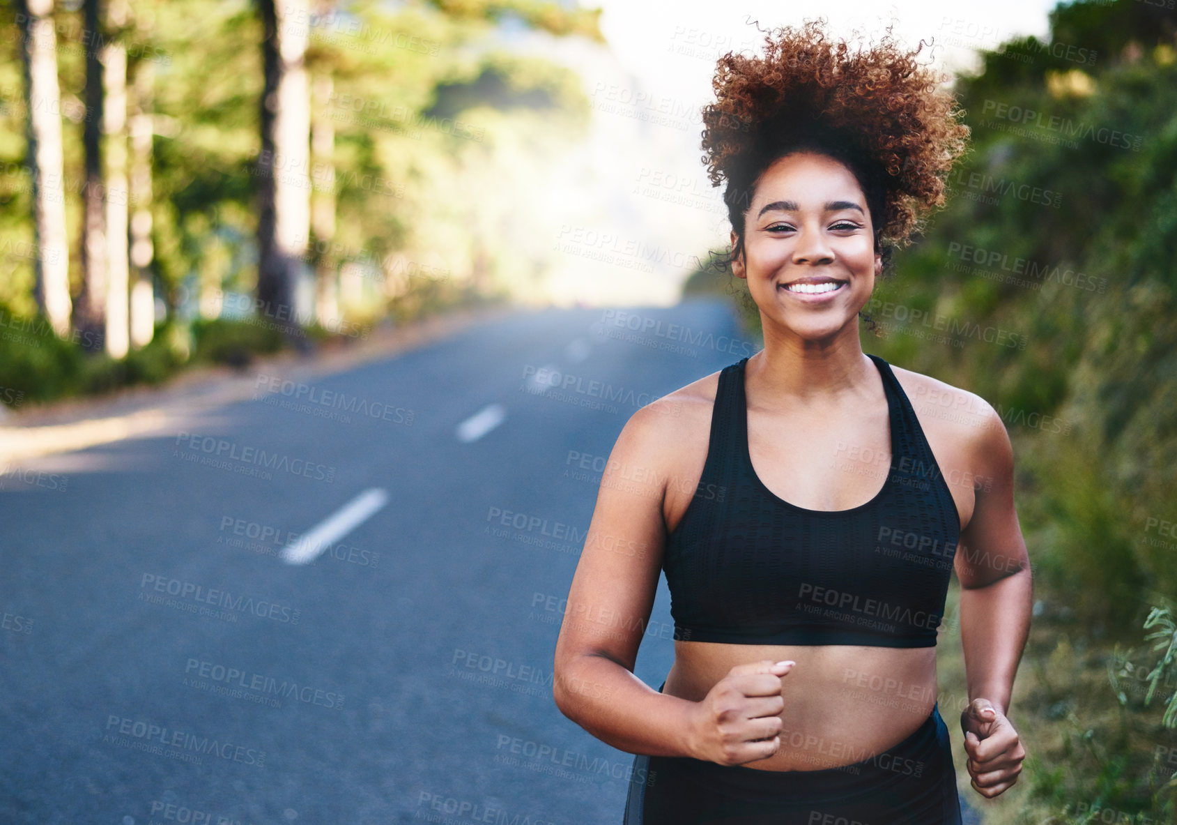 Buy stock photo Shot of a young woman out for her morning run
