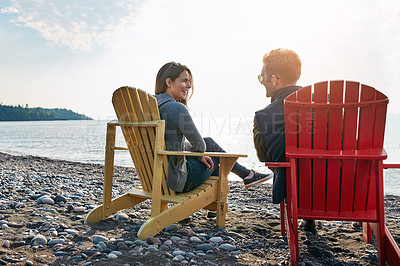 Buy stock photo Shot of a married couple enjoying a day at the lake