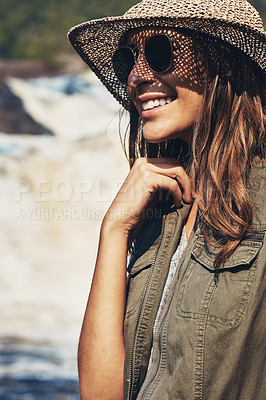 Buy stock photo Shot of an attractive young woman spending a day in nature