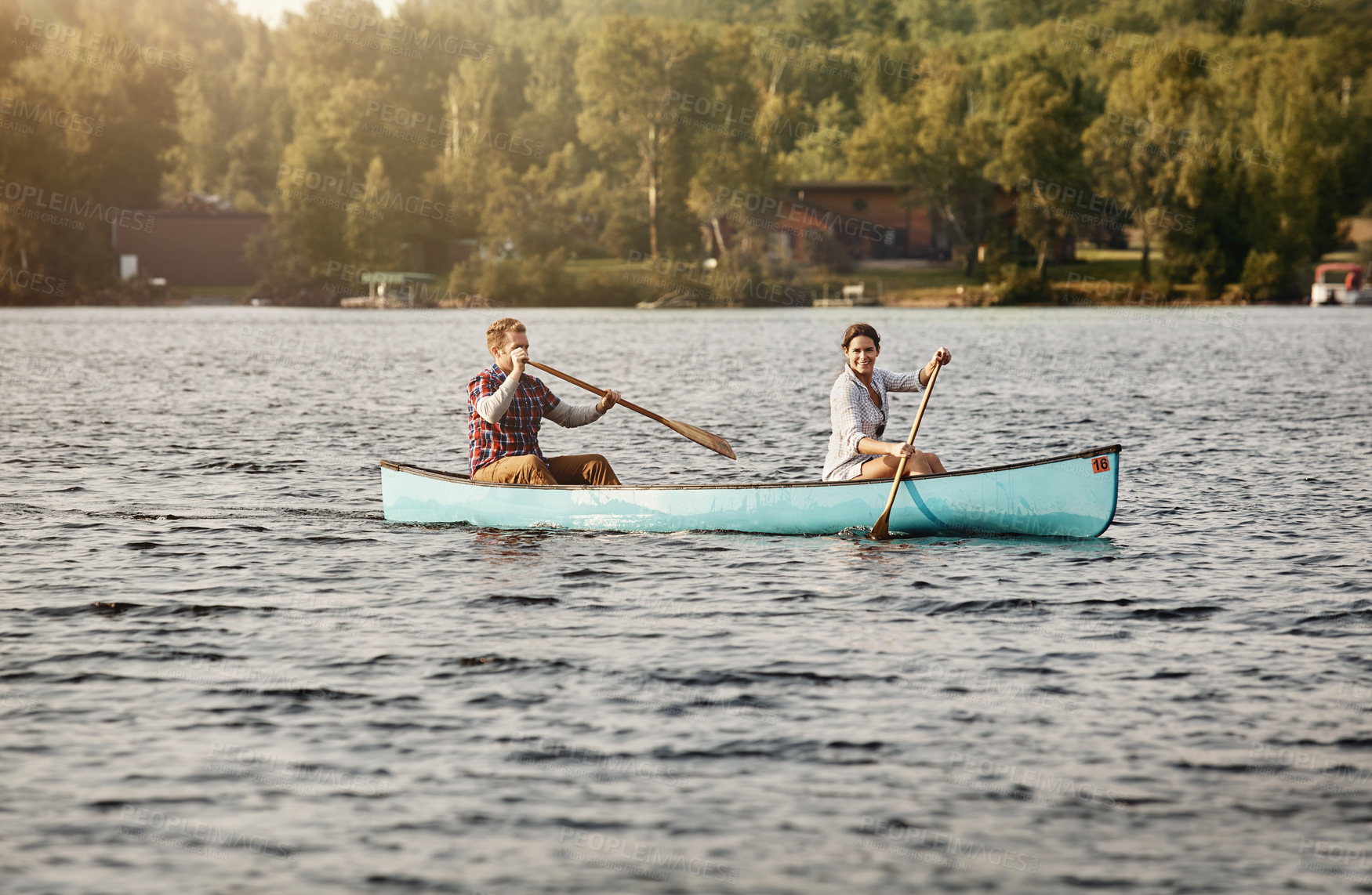 Buy stock photo Couple, kayak and paddle on lake for holiday, travel and adventure for activity on river. Rowing, water sports and vacation in Germany, survival skill or bootcamp in nature for married people on boat