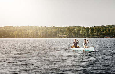 Buy stock photo Couple, kayak and rowing on lake for exercise, travel and adventure for activity on river. Paddle, water sports and vacation in Germany, sunshine and nature for married people on boat for fitness