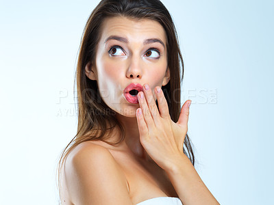 Buy stock photo Wow, hand and woman surprised, shocked and omg expression for skincare results on blue background. Face, wtf and girl model with open mouth emoji for makeup, glamour and luxury cosmetic isolated