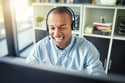 Buy stock photo Cropped shot of a young handsome male customer support agent working in the office