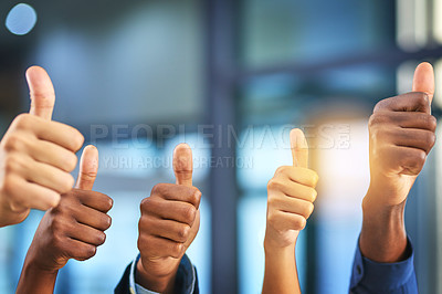 Buy stock photo Cropped shot of a group of businesspeople giving thumbs up in a modern office
