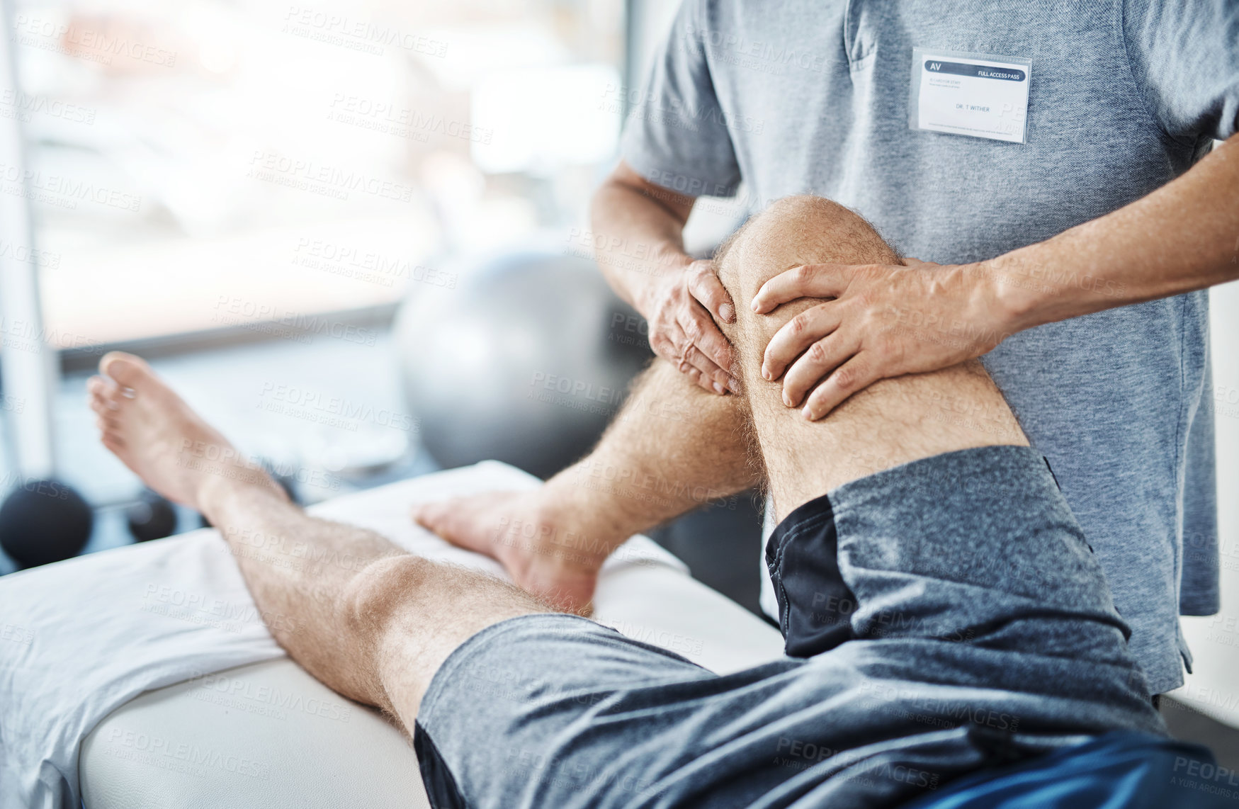 Buy stock photo Closeup shot of an unrecognizable physiotherapist treating a patient