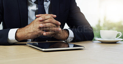 Buy stock photo Closeup shot of an unidentifiable businessman using a digital tablet in an office