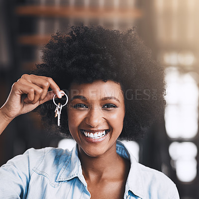 Buy stock photo Cropped shot of an attractive young woman holding house keys in her new home