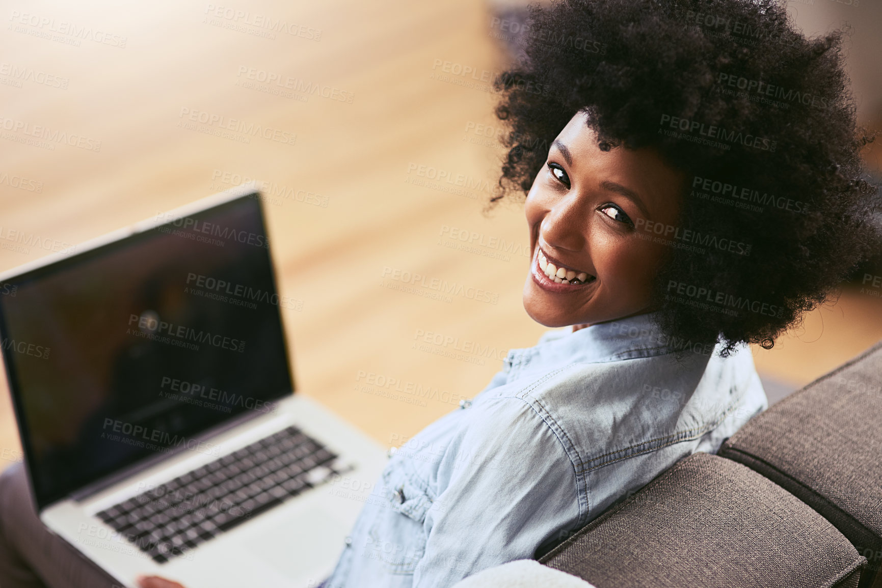 Buy stock photo Black woman, laptop and portrait on sofa in house for internet, networking and research with smile. Technology, happy and remote work as social media manager for company, agency or business in home