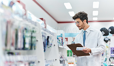 Buy stock photo Pharmacist, medicine and man with a clipboard in pharmacy to check stock of products in retail store. Male person, pharmaceutical and medical industry for service, healthcare and inventory on shelf