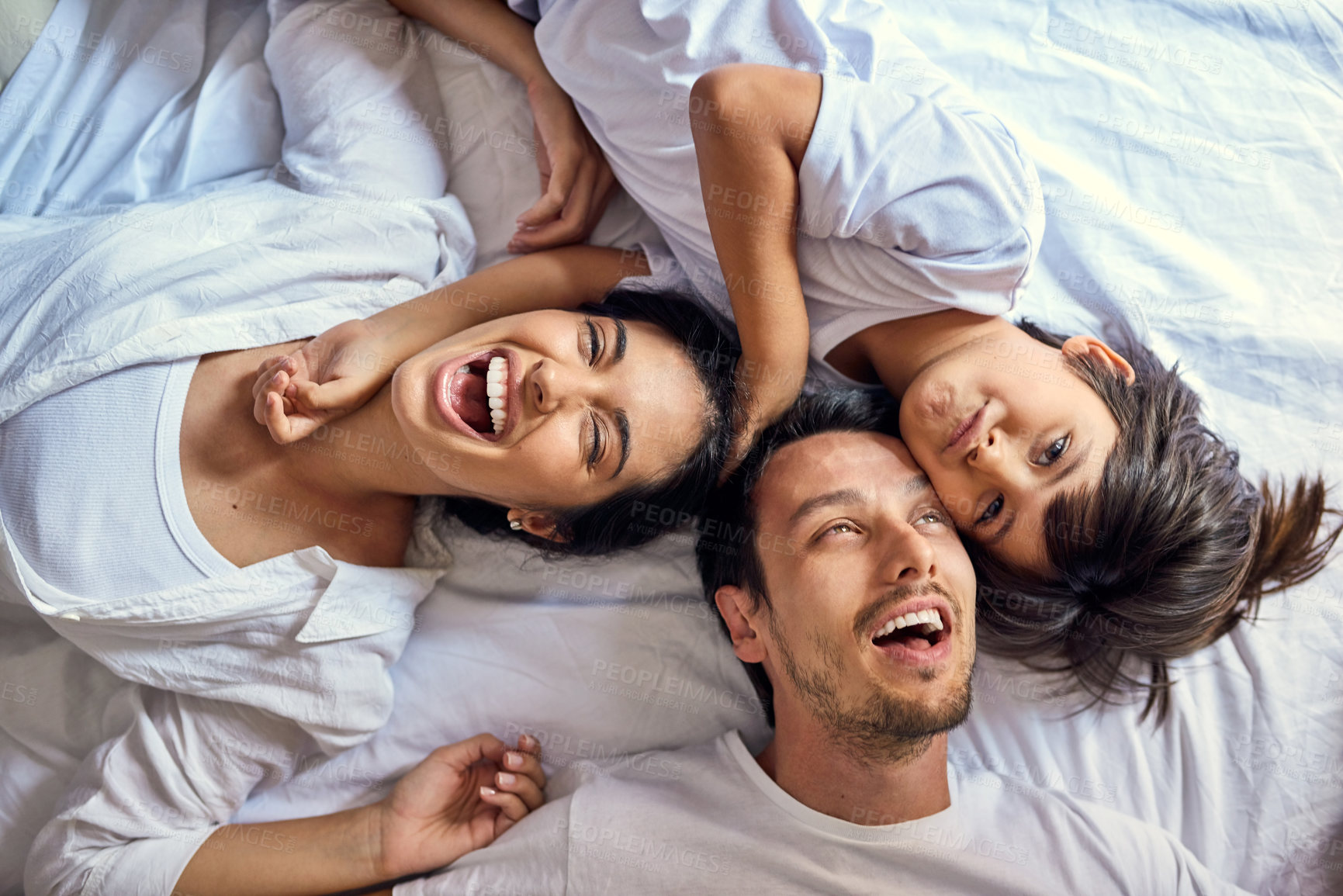 Buy stock photo Portrait of a happy family bonding together at home