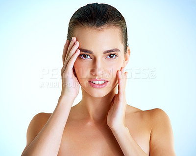 Buy stock photo Touch, face and woman in studio, skincare and anti aging with treatment, glow and proud of results. Morning, routine and dermatology for smooth, soft and shine of skin, hands and portrait of person