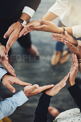 Buy stock photo Teamwork, solidarity and business people with their hands together in a circle for unity. Collaboration, friends and top view of multiracial employees with connection for team building in the office.