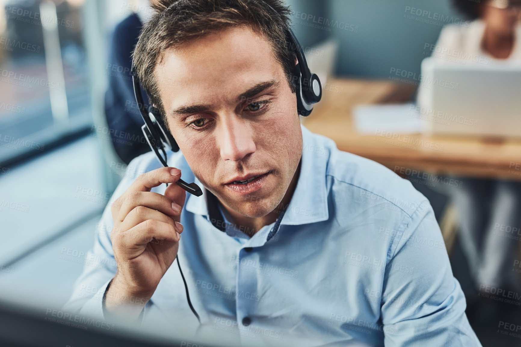 Buy stock photo Businessman, call center and consulting with headphones in customer support, service or telemarketing at office. Man employee consultant or agent talking on PC for online advice or help in contact us