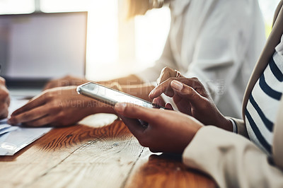 Buy stock photo Hands of woman typing on phone for innovation on the internet while looking for a mobile app in an office. Closeup of creative business woman using social media for marketing and communication