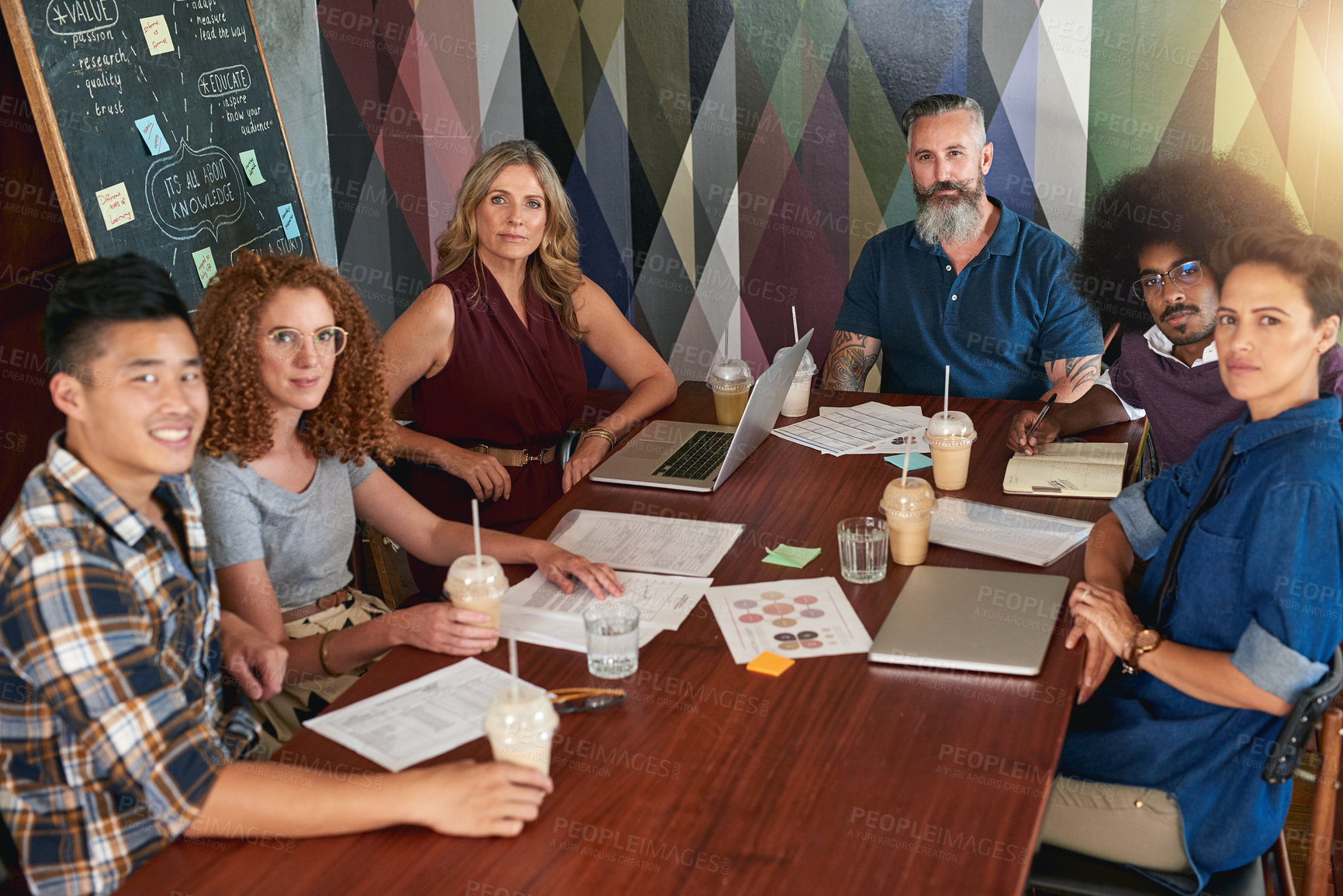 Buy stock photo Cropped shot of creative colleagues having a meeting in a modern office