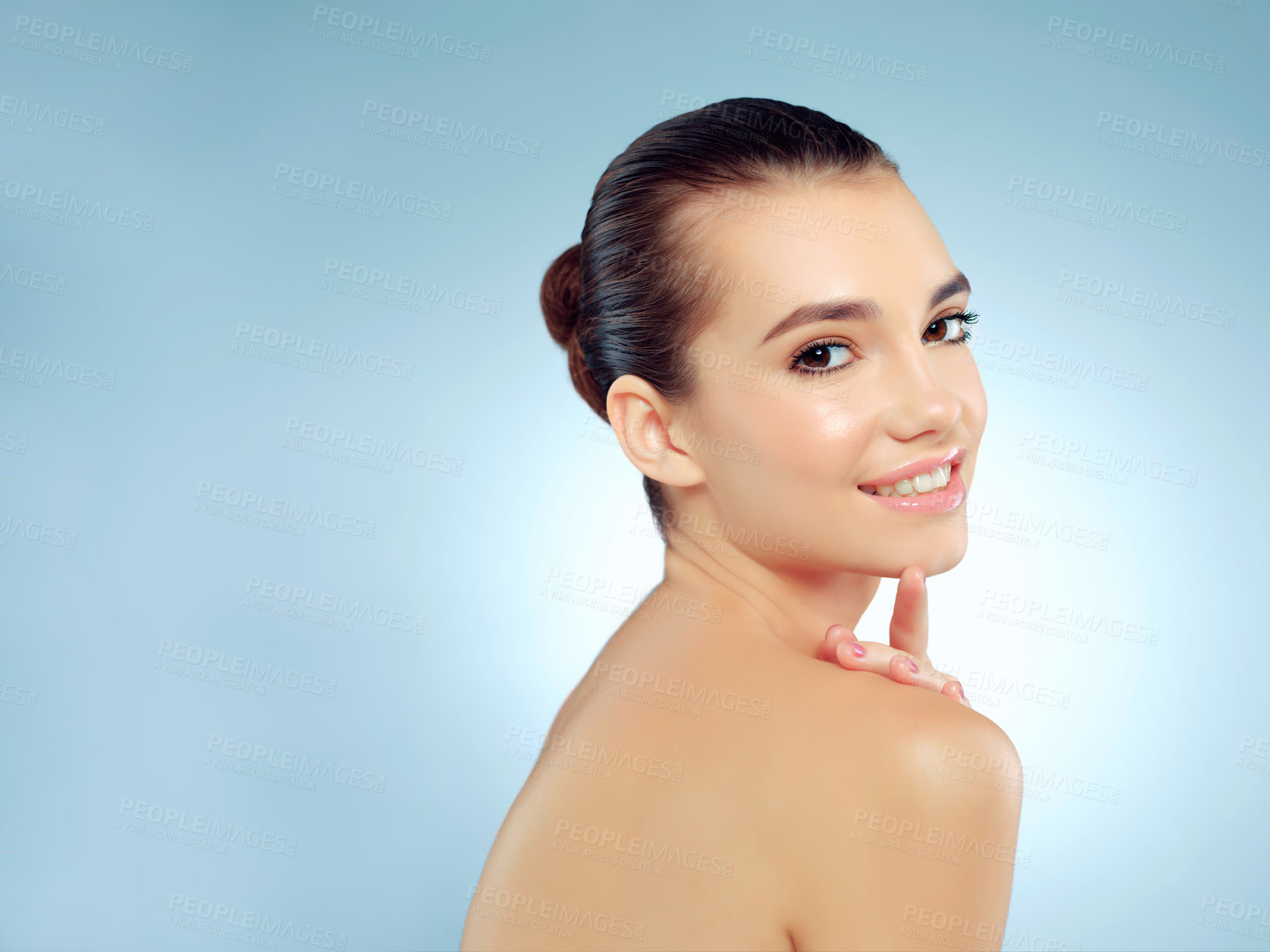 Buy stock photo Skincare, portrait and woman in studio, happy  and wellness with cosmetics, shine and treatment in spa. Blue background, beauty and dermatology for skin, relax and proud of hydration and mockup space