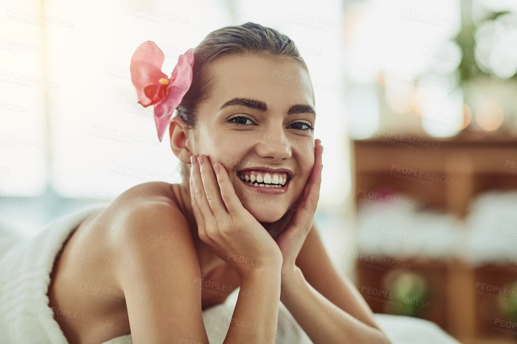 Buy stock photo Portrait of an attractive young woman getting pampered at a beauty spa