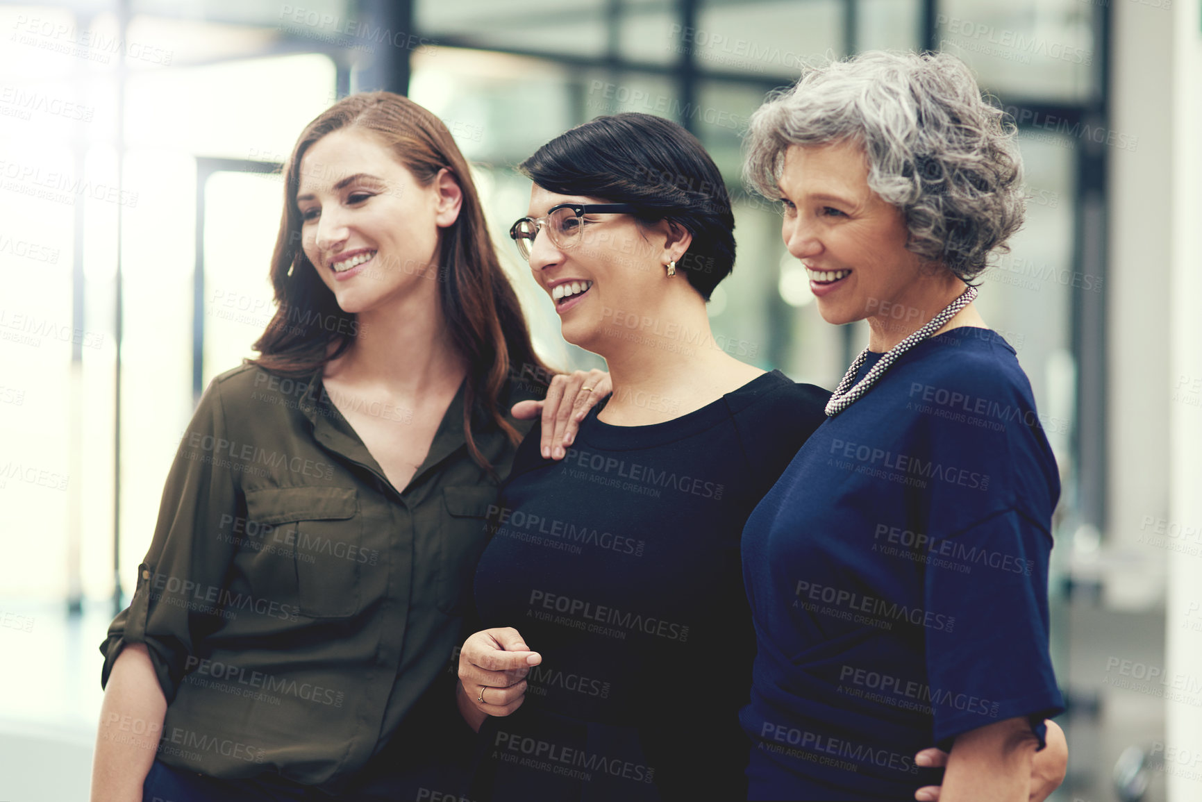 Buy stock photo Shot of a group of businesswomen standing in an office